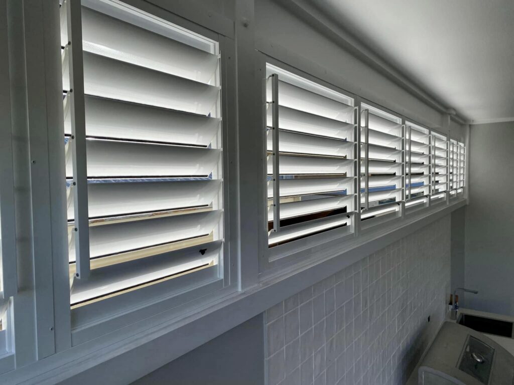 Aluminium shutters with adjustable louvres