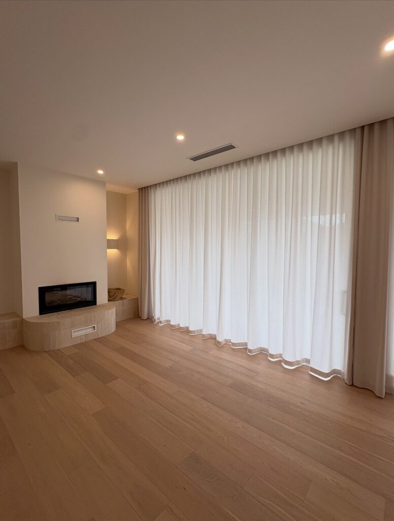 Wall-to-wall S wave sheer curtains with hidden tracks